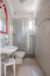 Koupelna v ubytování Hotel Ragno + 21 fotografií