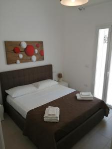 A bed or beds in a room at Residence Valentina int 4 - Rooftop Sea View Infinity Pool
