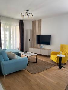 TV a/nebo společenská místnost v ubytování Sky&River Apartment Sarajevo + 31 fotografií