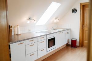 Kuchyňa alebo kuchynka v ubytovaní Ferienwohnung Perner - die Huabm
