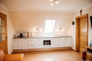 Kuchyňa alebo kuchynka v ubytovaní Ferienwohnung Perner - die Huabm