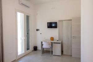 TV a/nebo společenská místnost v ubytování Paloma B&B