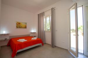 Postel nebo postele na pokoji v ubytování Paloma B&B