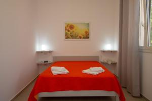 Postel nebo postele na pokoji v ubytování Paloma B&B