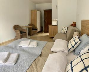 Postel nebo postele na pokoji v ubytování H2O