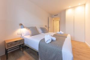 Posteľ alebo postele v izbe v ubytovaní Bravissimo Afra, 2-bedroom apartment