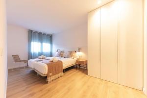 Posteľ alebo postele v izbe v ubytovaní Bravissimo Afra, 2-bedroom apartment
