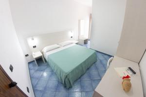 Postel nebo postele na pokoji v ubytování Alba D'Amore Hotel & Spa