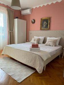 Postel nebo postele na pokoji v ubytování Apartmani Zorica