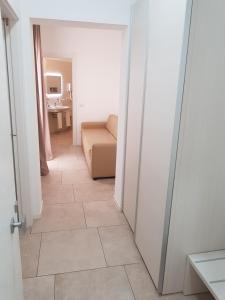 Postel nebo postele na pokoji v ubytování Alba D'Amore Hotel & Spa