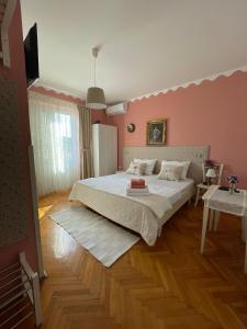 Postel nebo postele na pokoji v ubytování Apartmani Zorica