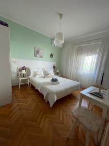 Postel nebo postele na pokoji v ubytování Apartmani Zorica