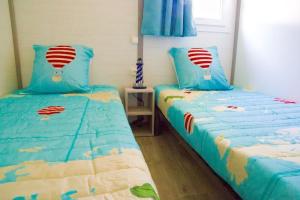 Postel nebo postele na pokoji v ubytování Campo Vecchio Sole et Piscine
