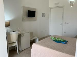 Postel nebo postele na pokoji v ubytování Alba D'Amore Hotel & Spa