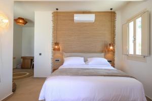 Cama ou camas em um quarto em Life Suites
