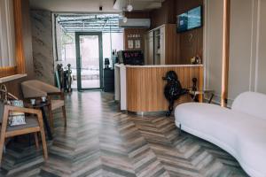 a room with a lobby with a counter and a room with at Hotel BLVD 7 in Plovdiv