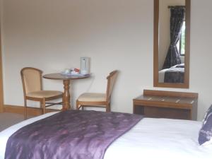 Letto o letti in una camera di B&B The Silver Eel
