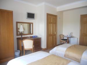 Letto o letti in una camera di B&B The Silver Eel