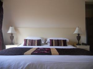 Letto o letti in una camera di B&B The Silver Eel