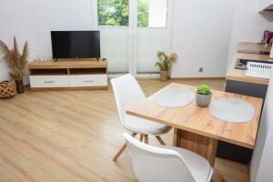 Kuchnia lub aneks kuchenny w obiekcie Apartamenty Legionów 30