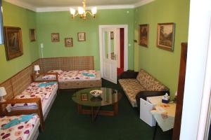 Postel nebo postele na pokoji v ubytování Hotel Corrado