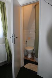 Koupelna v ubytování Hotel Corrado