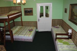 Postel nebo postele na pokoji v ubytování Hotel Corrado