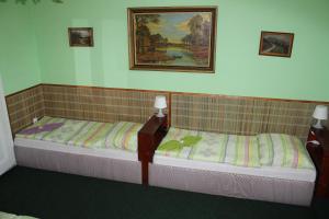 Postel nebo postele na pokoji v ubytování Hotel Corrado