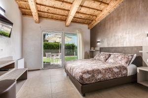 Postel nebo postele na pokoji v ubytování I Delfini - Natural B&B + 37 fotografií
