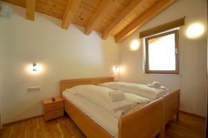 Posteľ alebo postele v izbe v ubytovaní Ski Chalet Jim by All in One Apartments