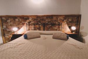 A bed or beds in a room at Agriturismo Gragonti, Arbus Costa Verde