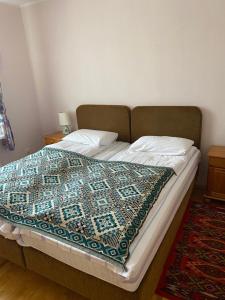 Postel nebo postele na pokoji v ubytování Majori Guesthouse