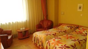 Postel nebo postele na pokoji v ubytování Hotel Express + 30 fotografií
