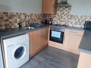 Кухня или кухненски бокс в Alexander Apartments South Tyneside