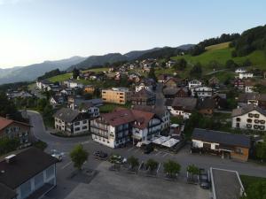 an aerial view of a small town in the mountains at Gasthaus Krone in Übersaxen
