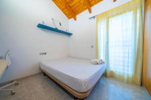 Llit o llits en una habitació de HomeHolidaysRentals Bianca - Costa Barcelona