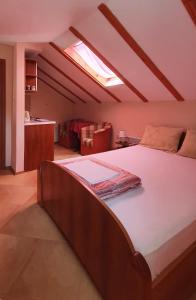 a bedroom with a large bed in a room at Villa Sunrise in Herceg-Novi