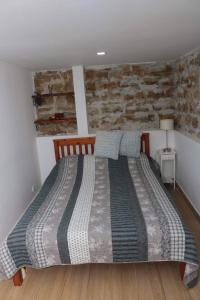 Кровать или кровати в номере Nature House Bulgaria