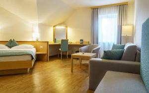 Postel nebo postele na pokoji v ubytování Hotel-Restaurant Gollner + 37 fotografií