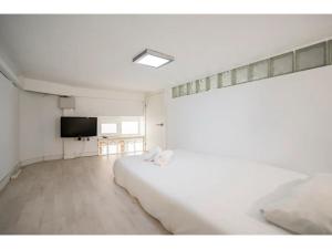 Ein Bett oder Betten in einem Zimmer der Unterkunft Espacioso Loft en Ponzano-Chamberí– Madrid
