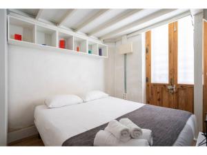 Ein Bett oder Betten in einem Zimmer der Unterkunft Espacioso Loft en Ponzano-Chamberí– Madrid