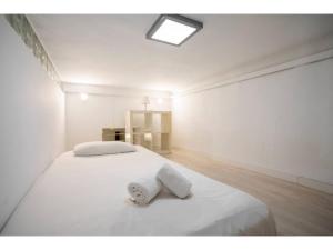Ein Bett oder Betten in einem Zimmer der Unterkunft Espacioso Loft en Ponzano-Chamberí– Madrid
