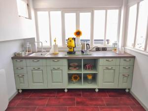 A kitchen or kitchenette at R&D Rest and Dream Capri