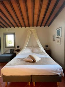 Postel nebo postele na pokoji v ubytování Casale La Gora - B&B di charme