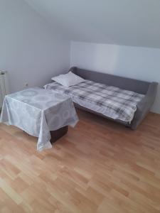 Postel nebo postele na pokoji v ubytování Apartmani Marić