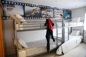 Postel nebo postele na pokoji v ubytování Zambeachouse - Hostel Paradise