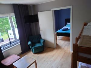 Ένα ή περισσότερα κρεβάτια σε δωμάτιο στο Vena Värdshus