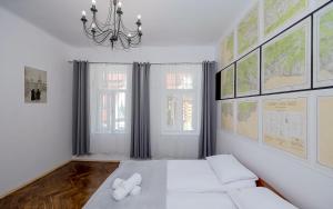 Łóżko lub łóżka w pokoju w obiekcie Willa Konradówka (apartament Tolin)