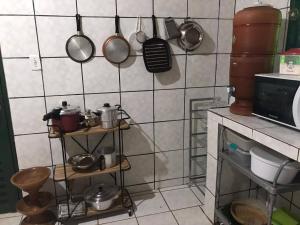 Dapur atau dapur kecil di Refúgio Mundo dos Pássaros