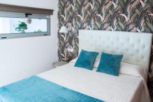 Postel nebo postele na pokoji v ubytování Casa Alicia + 6 fotografií